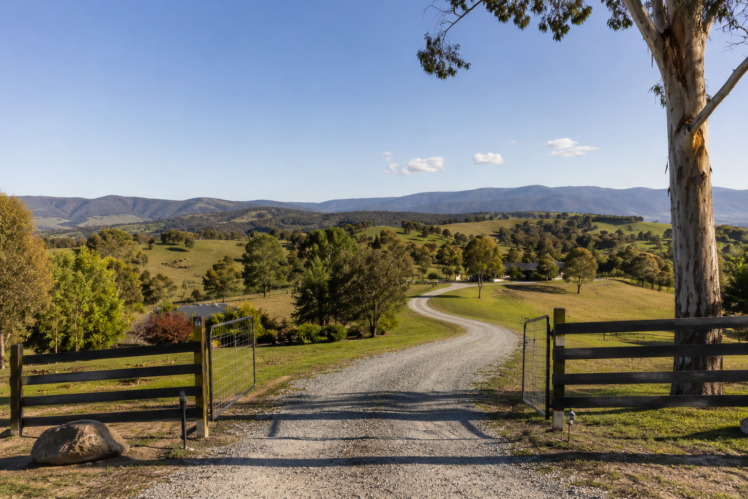 Rural countryside entrance under wide sky